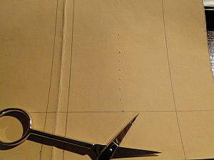 prick marks running down centre of text area