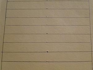 lines ruled across prick marks