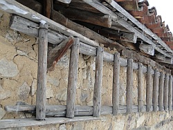 Ladder hanging horizontally against a wall